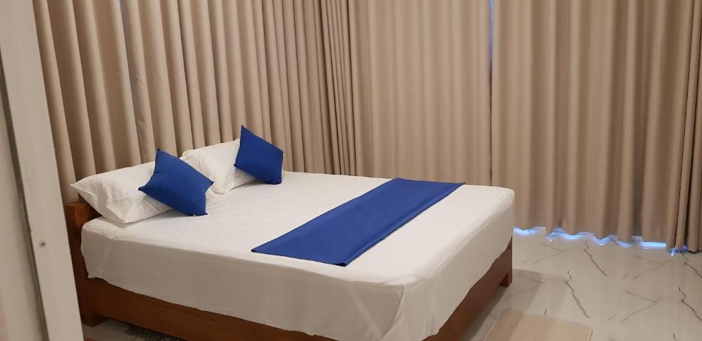 Postel nebo postele na pokoji v ubytování Fairview Residence