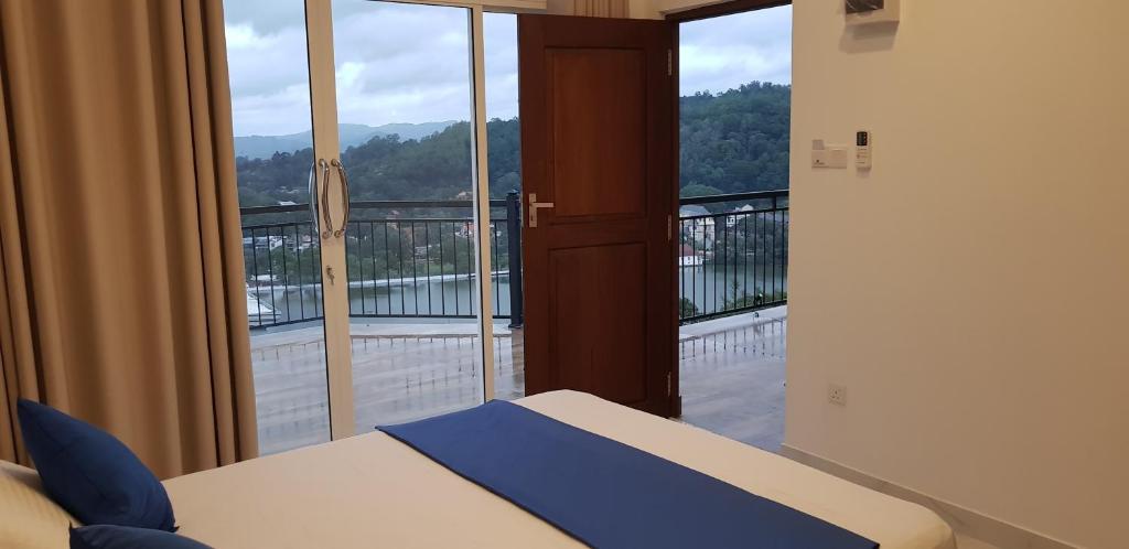 Postel nebo postele na pokoji v ubytování Fairview Residence