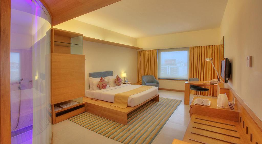 Postel nebo postele na pokoji v ubytování Hotel Parc Estique
