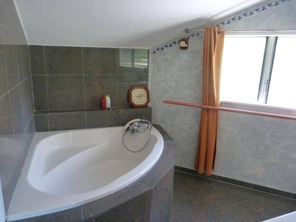 Ein Badezimmer in der Unterkunft Villa Flamboyant