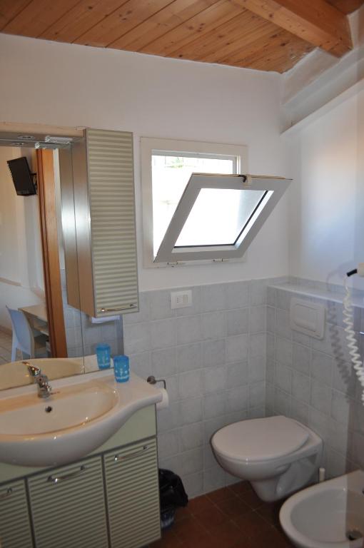 Koupelna v ubytování Hotel Albatros