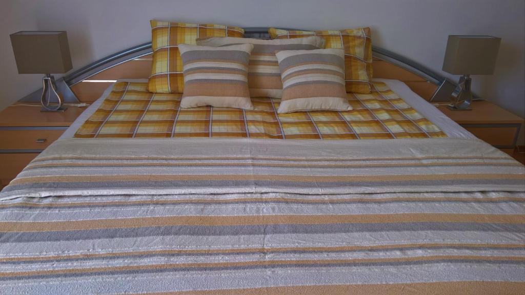 Postel nebo postele na pokoji v ubytování Apartmán Zderadova