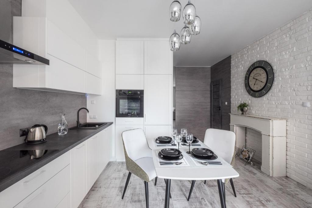 Kuchyňa alebo kuchynka v ubytovaní Good Time Apartment Business Center