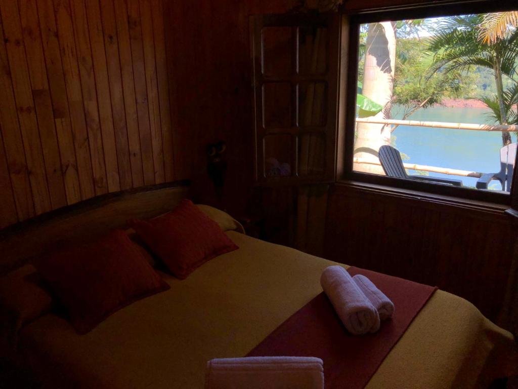 Postel nebo postele na pokoji v ubytování Costa del Sol Iguazú