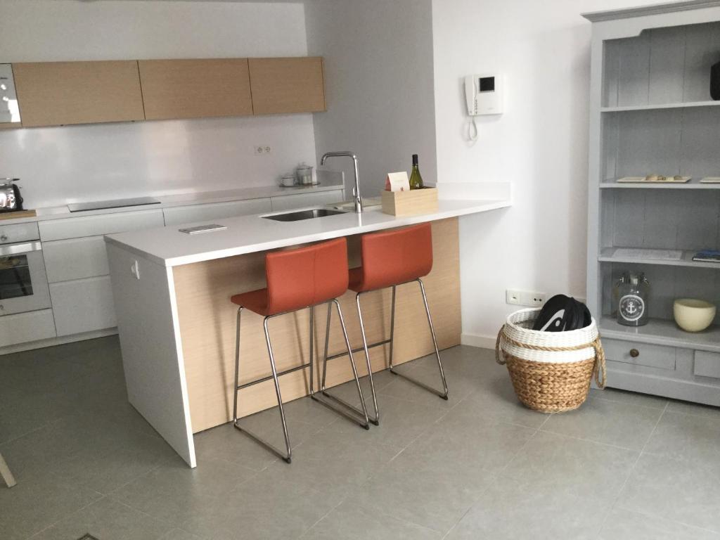 A kitchen or kitchenette at AMAZING DUPLEX on the beach
