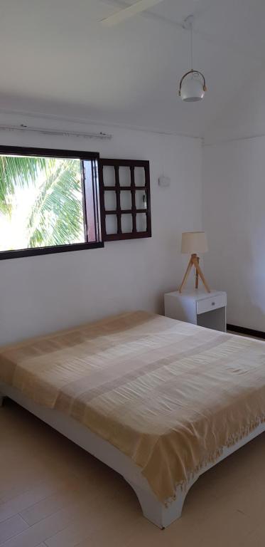 Letto o letti in una camera di Colibri Beach Villas