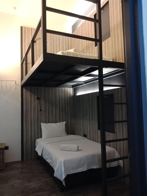 Postel nebo postele na pokoji v ubytování The Verve Hotel PJ Damansara