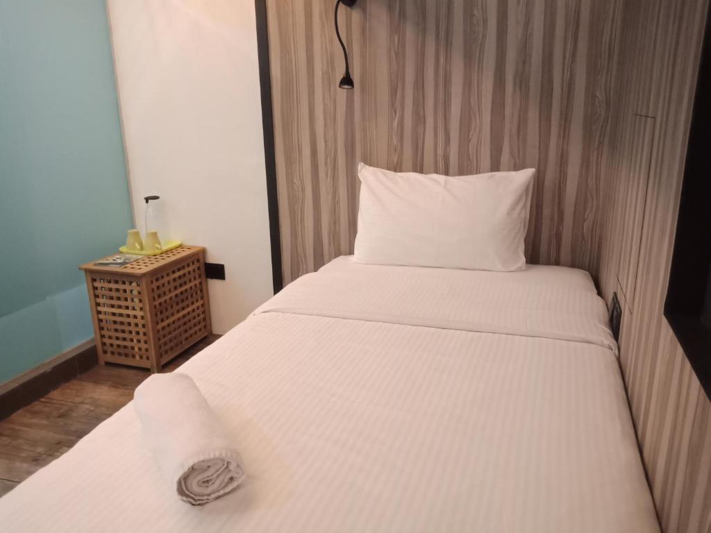 Postel nebo postele na pokoji v ubytování The Verve Hotel PJ Damansara