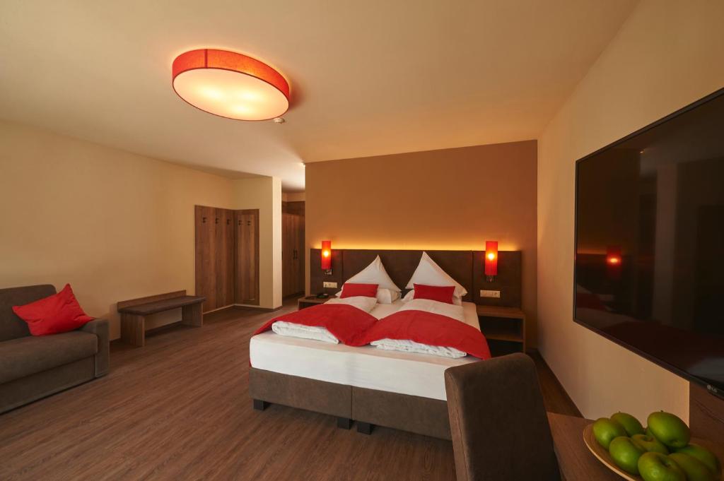 Postel nebo postele na pokoji v ubytování Hotel Gantkofel