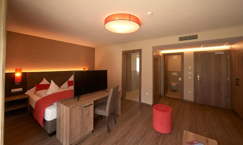 TV a/nebo společenská místnost v ubytování Hotel Gantkofel