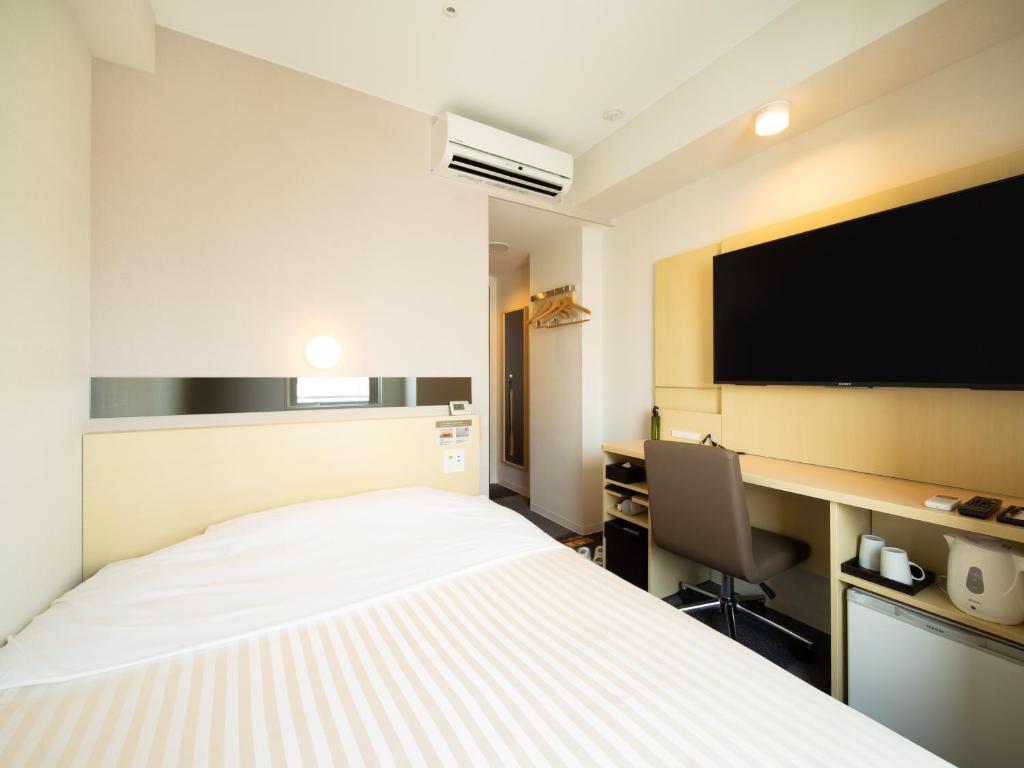 TV a/nebo společenská místnost v ubytování Super Hotel Tokyo Shiba