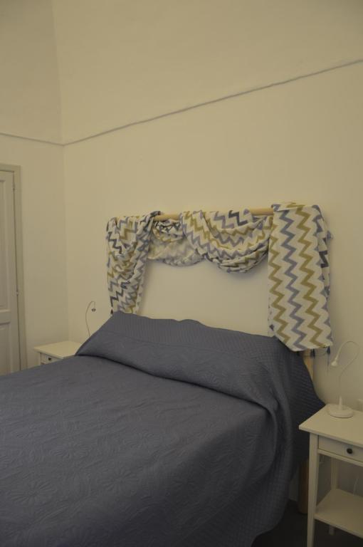 Postel nebo postele na pokoji v ubytování kammamia