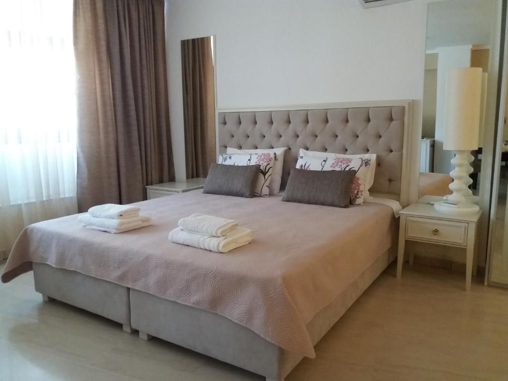 Postel nebo postele na pokoji v ubytování GreeceRent - LUX LADADIKA