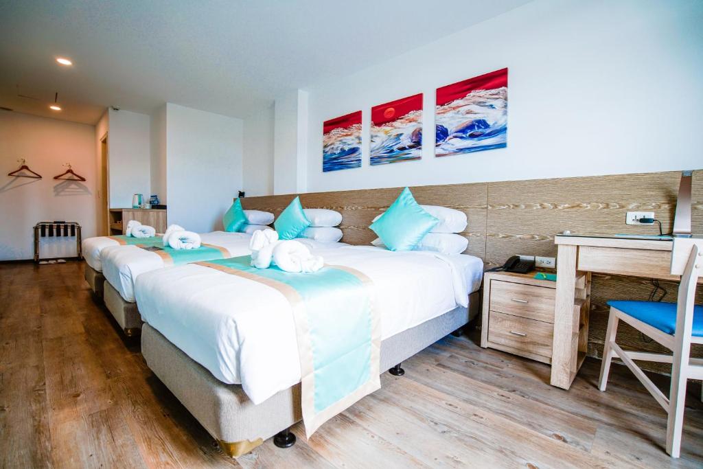 Postel nebo postele na pokoji v ubytování Palau Hotel