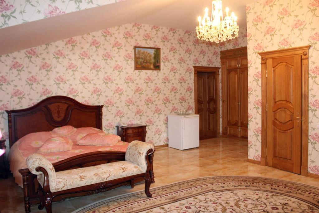 Postel nebo postele na pokoji v ubytování Ceasar