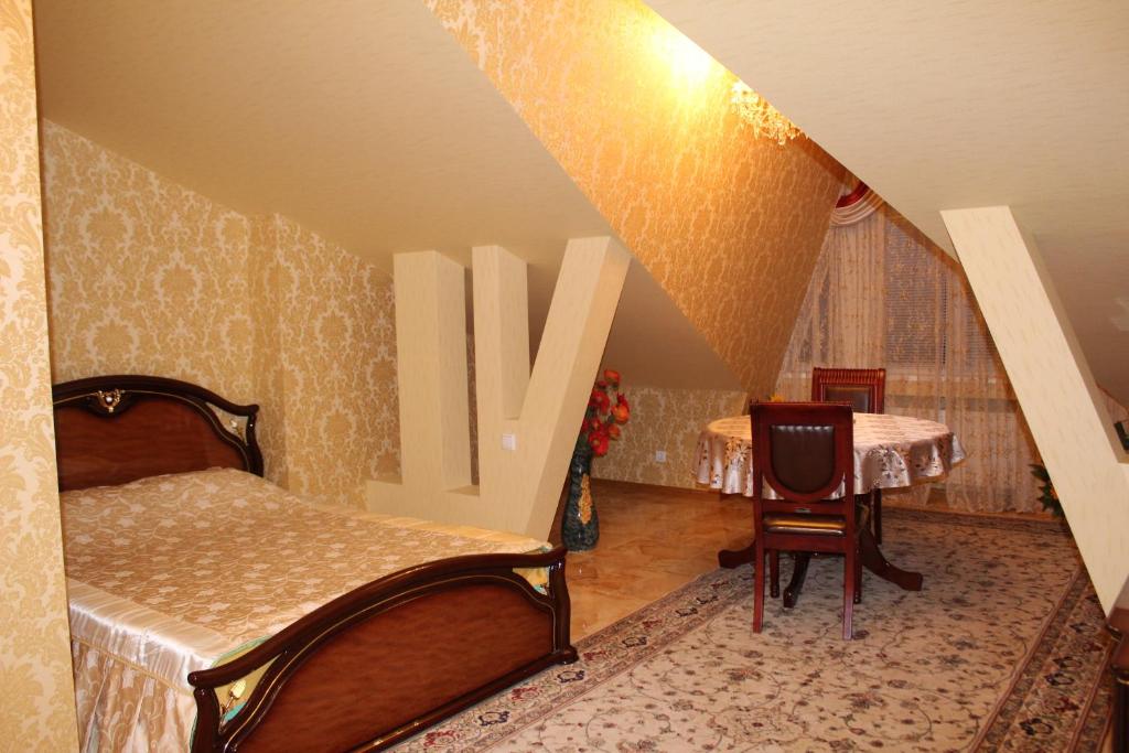 Postel nebo postele na pokoji v ubytování Ceasar