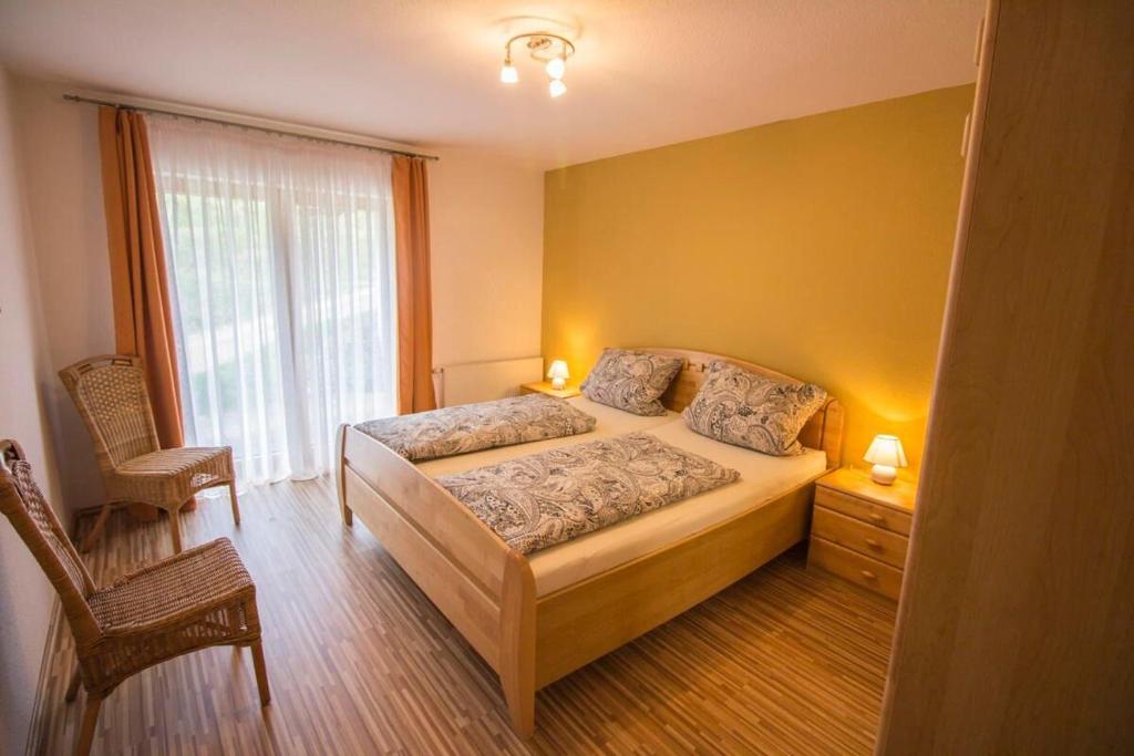 Postel nebo postele na pokoji v ubytování Steinhof