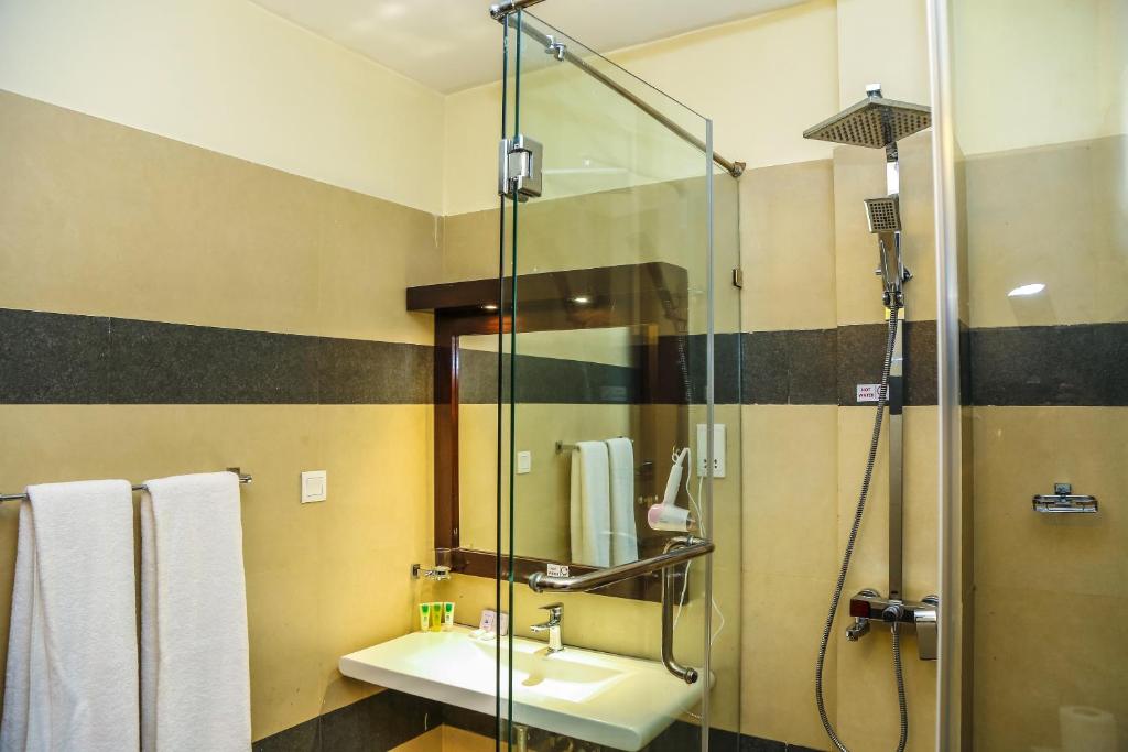 Koupelna v ubytování Oak Ray City Hotel