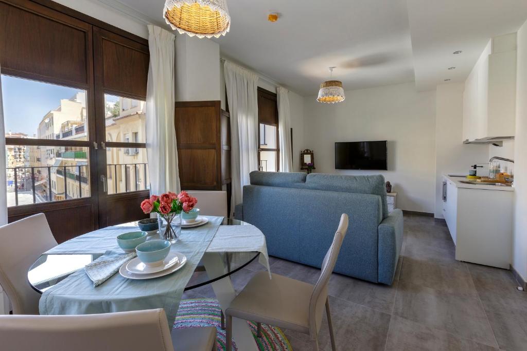 Posedenie v ubytovaní Apartamentos El Marqués
