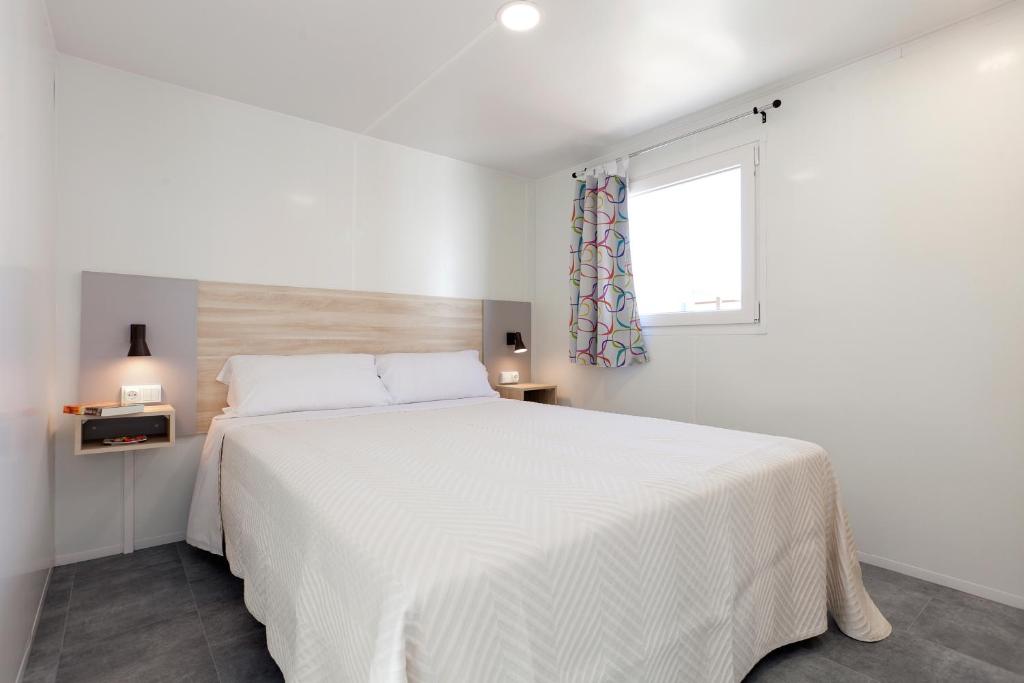Postel nebo postele na pokoji v ubytování La Siesta Salou Resort & Camping