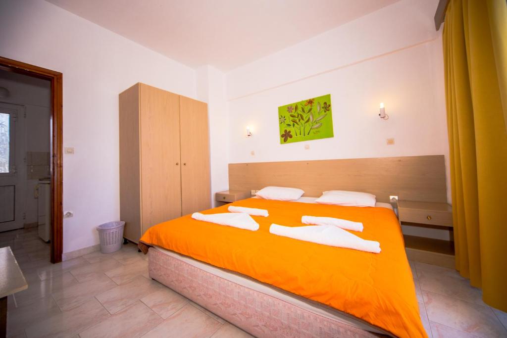 Postel nebo postele na pokoji v ubytování Sea Harmony