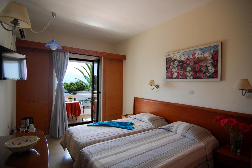 Postel nebo postele na pokoji v ubytování Lato hotel