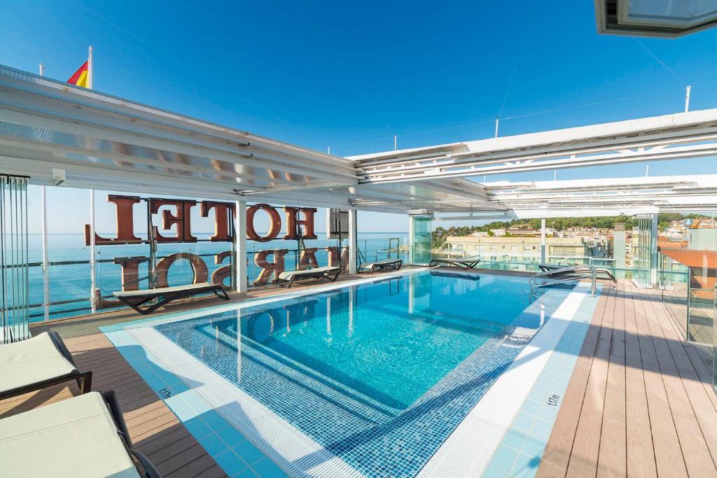 a swimming pool on top of a building at Hotel Marsol in Lloret de Mar