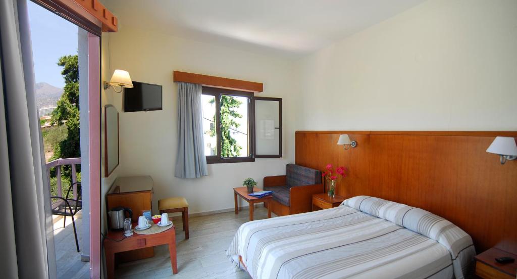 Postel nebo postele na pokoji v ubytování Lato hotel