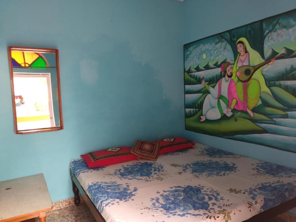 Postel nebo postele na pokoji v ubytování Hotel Paramount Palace
