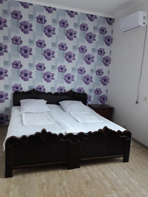 Postel nebo postele na pokoji v ubytování Tamuna Guest House