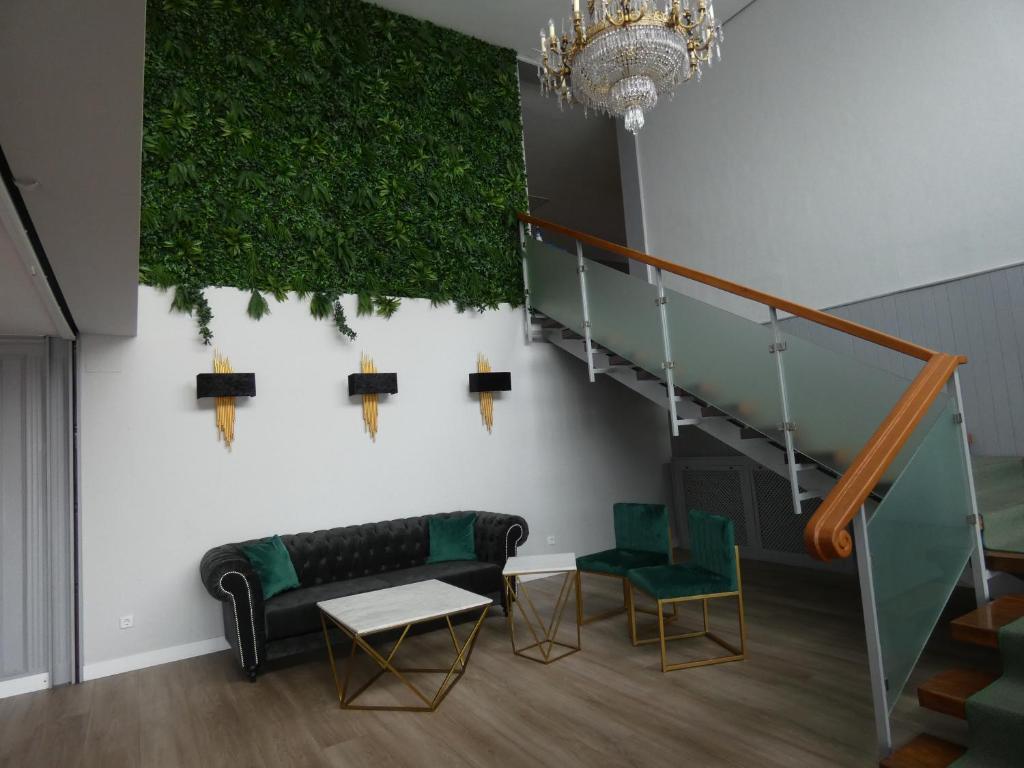 Posezení v ubytování Hotel Los Olivos