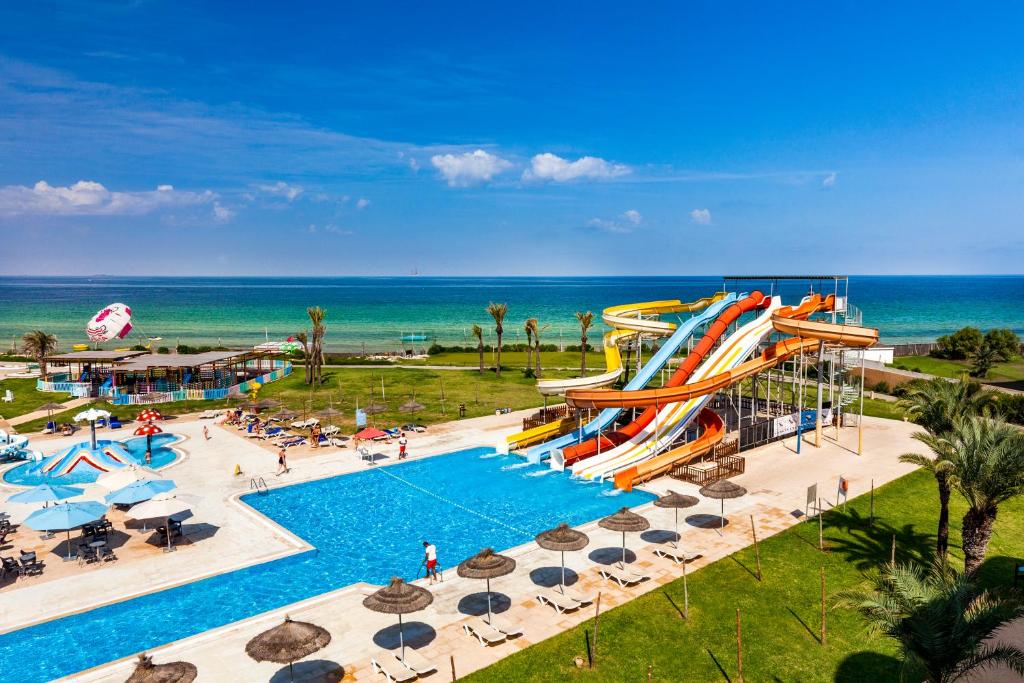 an image of a water park with a slide at Skanes Family Resort in Monastir