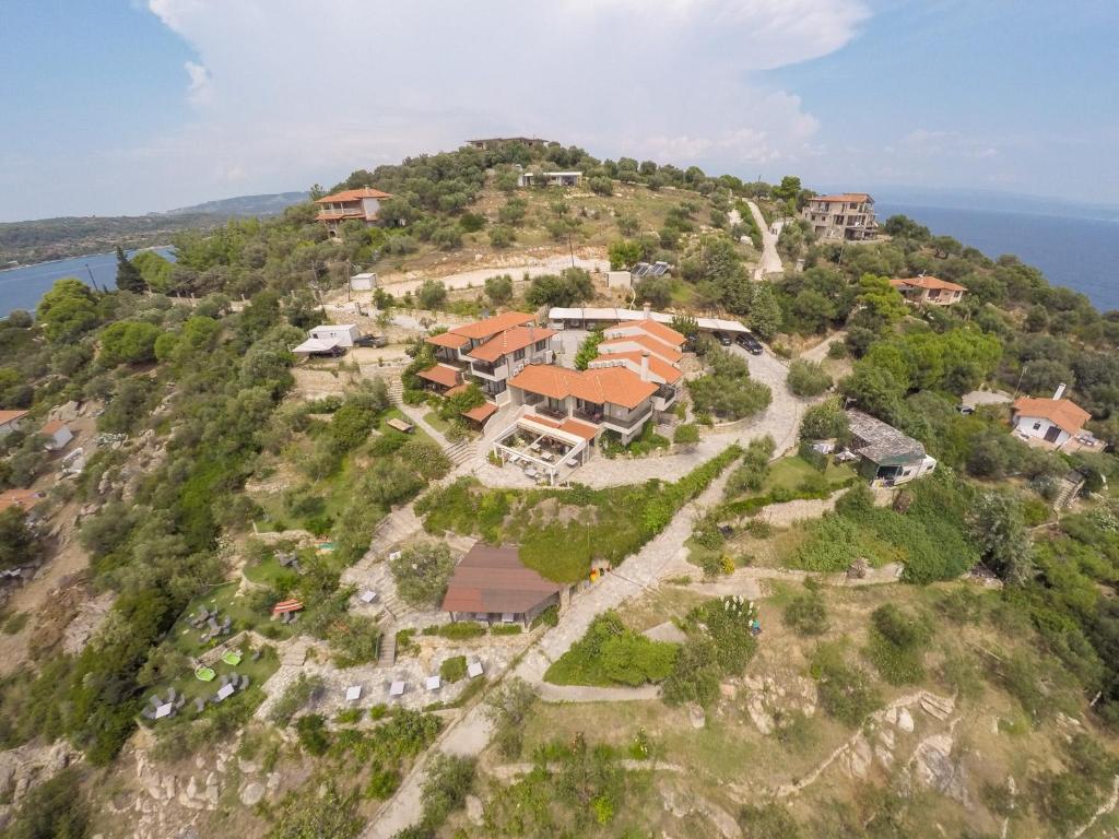 an aerial view of a house on a hill at Thalassokipos in Vourvourou