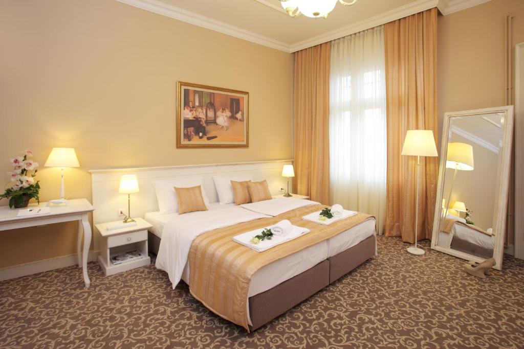 Vuode tai vuoteita majoituspaikassa Booking Rooms