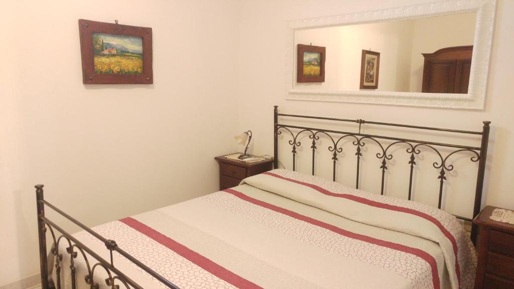 Postel nebo postele na pokoji v ubytování Villa Frantoio