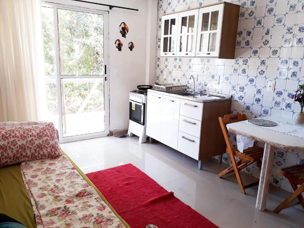 Una cocina o zona de cocina en Residencial Vila Sassari