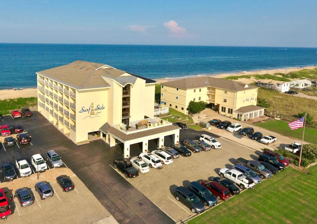 an aerial view of a hotel with a parking lot at Surf Side Hotel in Nags Head
