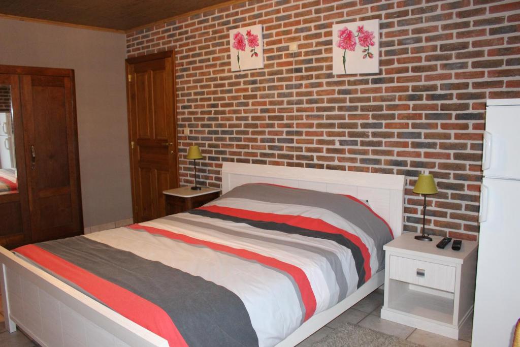 Postel nebo postele na pokoji v ubytování Breeden Steeger Hoeve