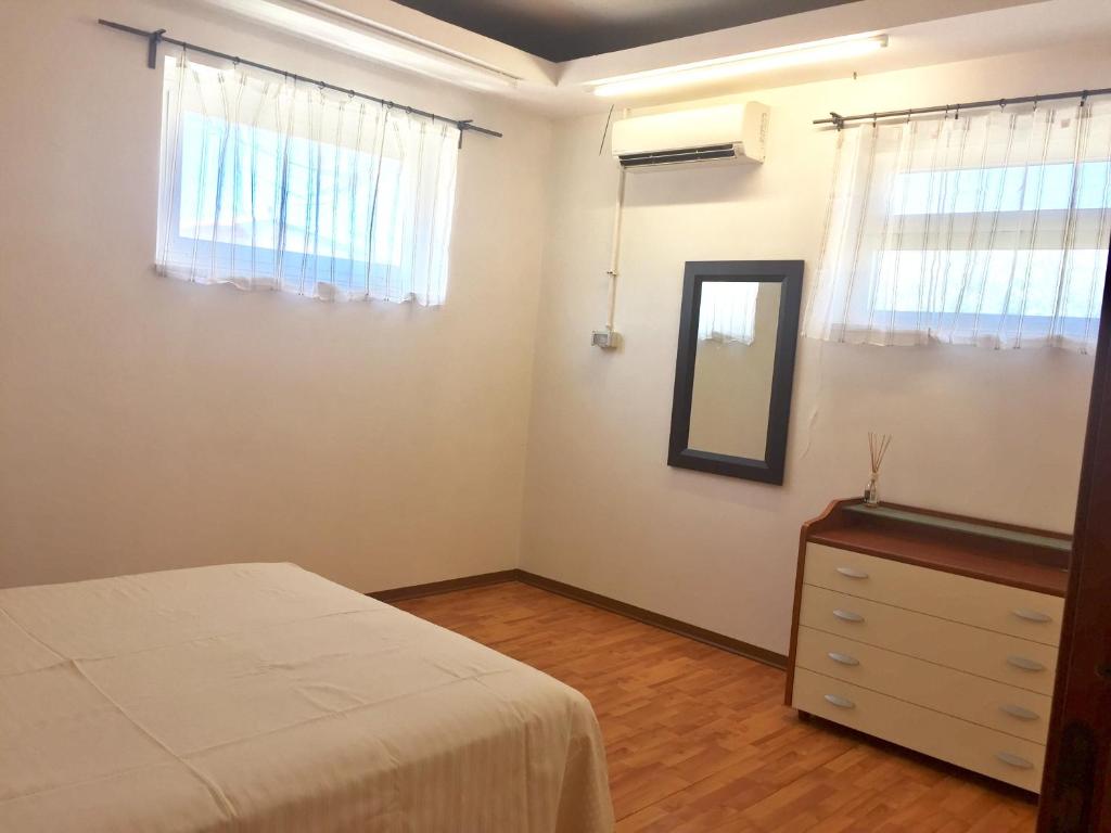 Łóżko lub łóżka w pokoju w obiekcie la casa di Frinky