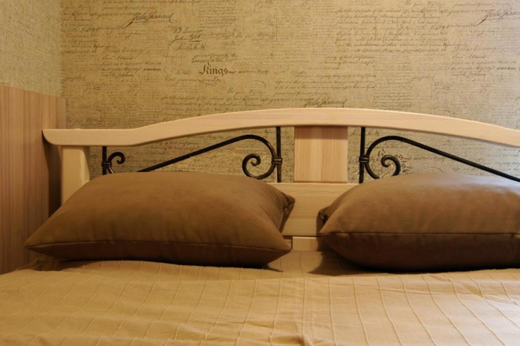 Posteľ alebo postele v izbe v ubytovaní Apartament Jedynka