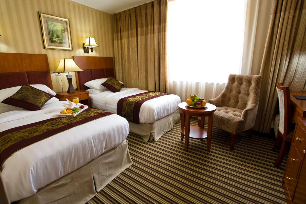 Postel nebo postele na pokoji v ubytování Hotel Park Exclusive