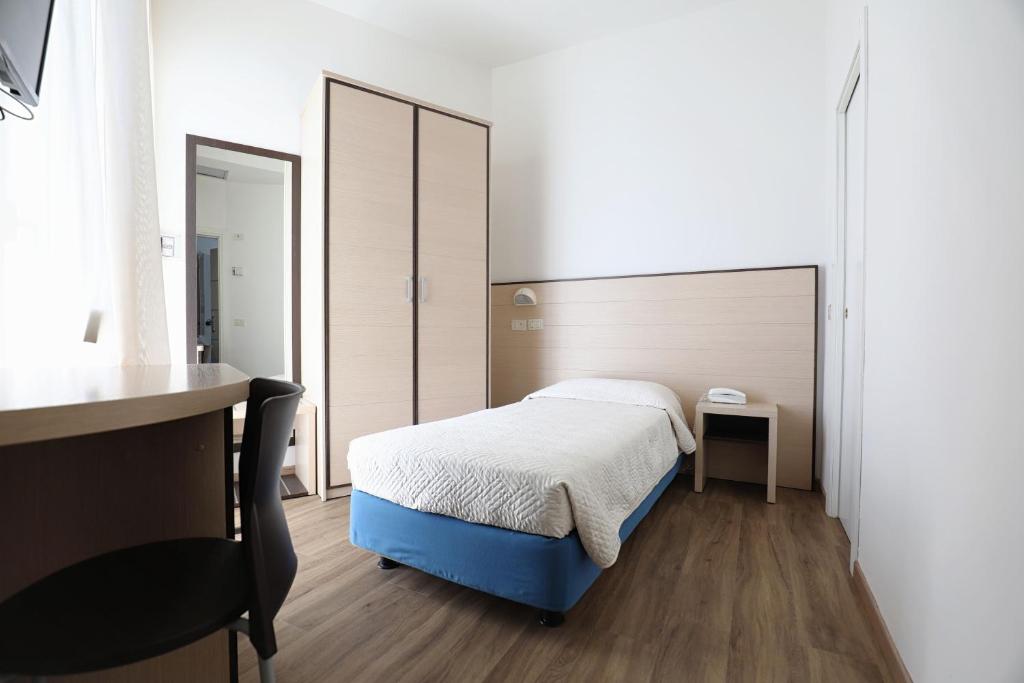 Postel nebo postele na pokoji v ubytování Hotel Daniel's FRONTE MARE