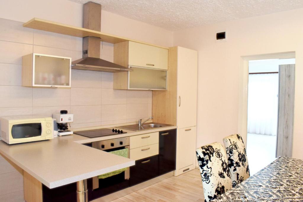 Kuchnia lub aneks kuchenny w obiekcie Relax apartman