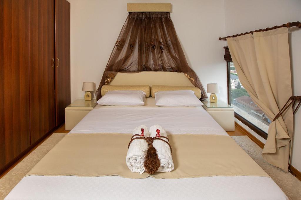 A bed or beds in a room at Villa Deluxe Sight