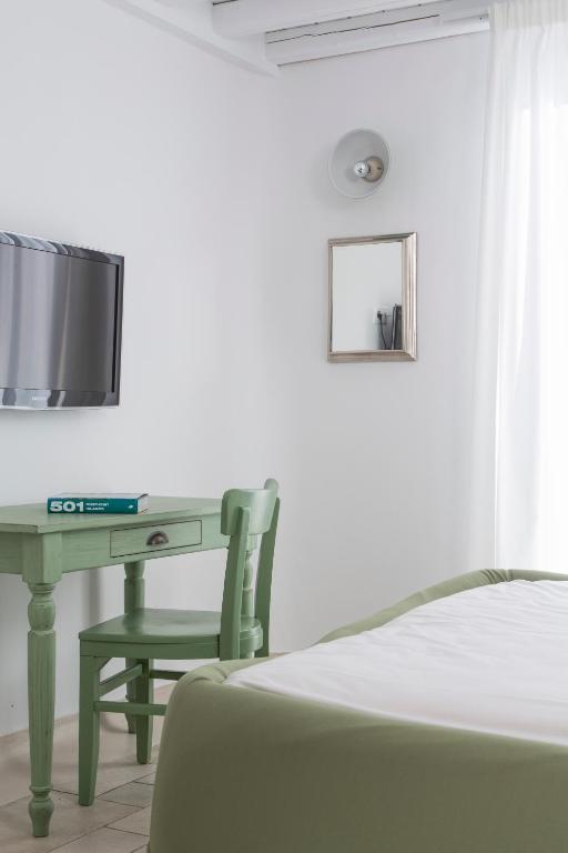 Postel nebo postele na pokoji v ubytování Villa Del Sol Mykonos