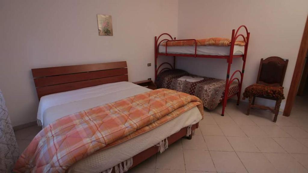 A bed or beds in a room at Agriturismo Bellavista