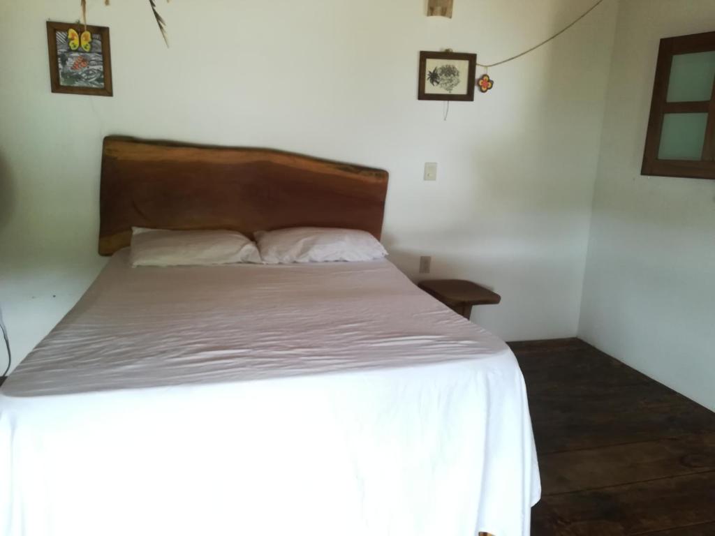 Postel nebo postele na pokoji v ubytování Cabañas La Isla Chacahua