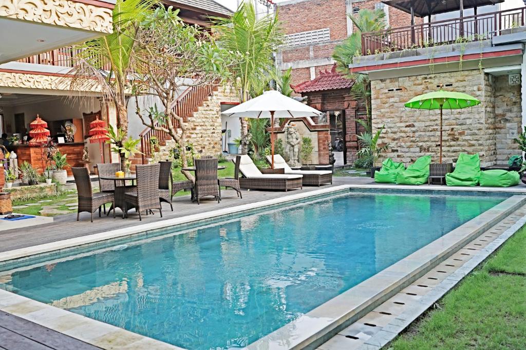 Bazén v ubytování Lebak Bali Residence nebo v jeho okolí