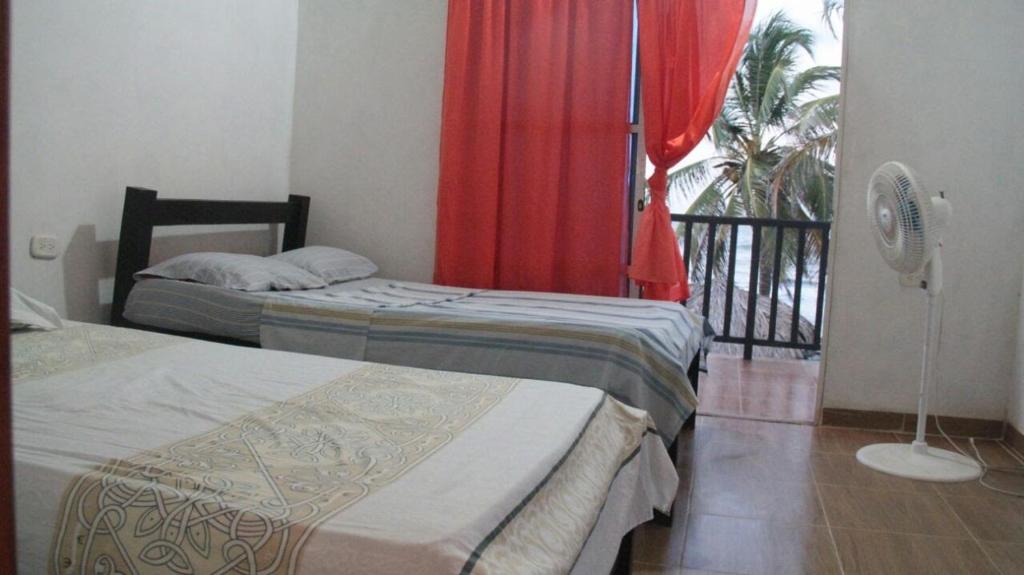 Posteľ alebo postele v izbe v ubytovaní Tadù Playa Hotel