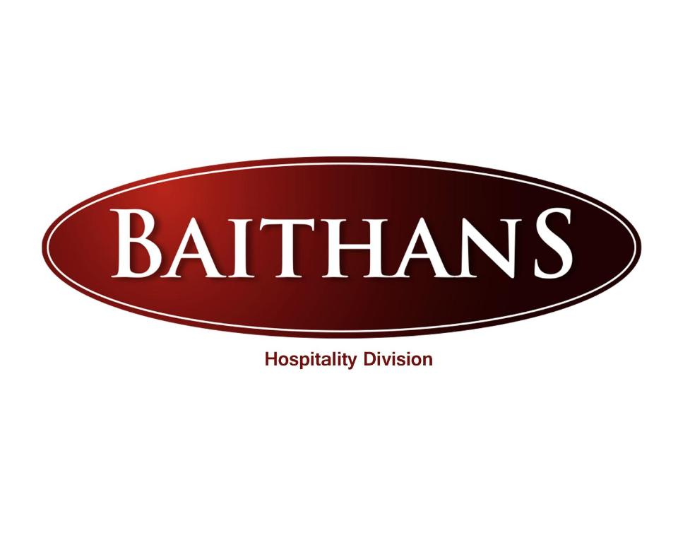 a sign for a restaurant with the word batarians at Sara Hotel Apartments in Ajman 